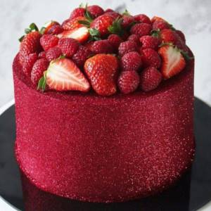 seasonal red berries on wedding cake
