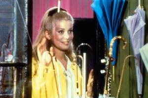 Deneuve gained wide fame after playing the leading role in Jacques Demy&#39;s musical melodrama The Umbrellas of Cherbourg, for which Michel Legrand wrote the music. Interestingly, the role of Genevieve Emery was originally supposed to go to Isabelle Aubray, a singer 