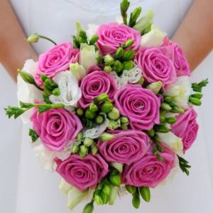 lilac roses in a wedding bouquet