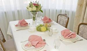 table with white tablecloth