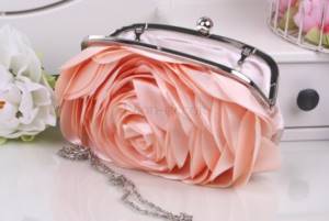 Bride&#39;s wedding handbag with peach rose