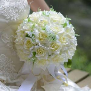 Wedding bouquets of roses in the shape of a ball
