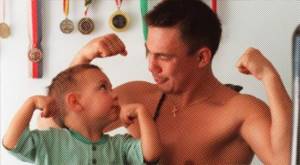 Tim Tszyu and the most important person on his team.jpg