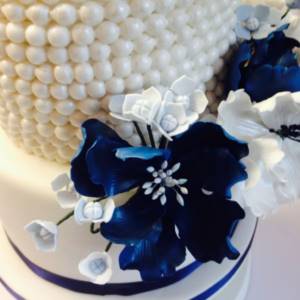 wedding cake with flowers and beads