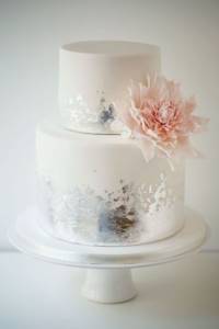 Cake with fresh flowers for a silver wedding