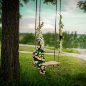 decorating a swing with flowers