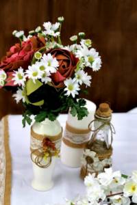 Vases on a wedding table in rustic style