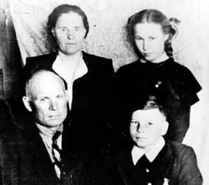 Vladimir Gostyukhin as a child with his parents and sister Marina