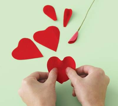 Cut out hearts from paper