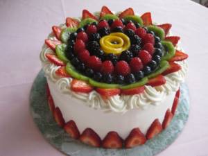 Berries and fruits on the cake