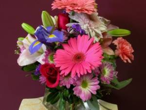 Bright bouquet with gerberas and irises