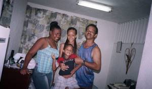 Young Rihanna with her parents and younger brother