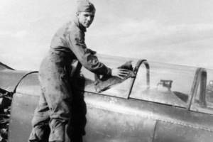 Yuri Gagarin wipes down his plane at the DOSAAF flying club in Saratov. 1954 
