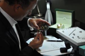 Jeweler examining a ring