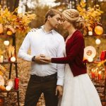 bride and groom in the autumn forest