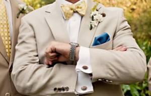 groom in a beige suit
