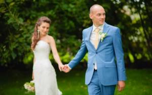 groom in a blue suit