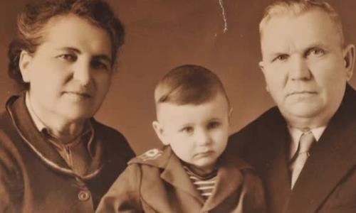 Zhenya as a child with his parents