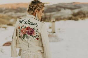 winter image of the bride, bride in a leather jacket